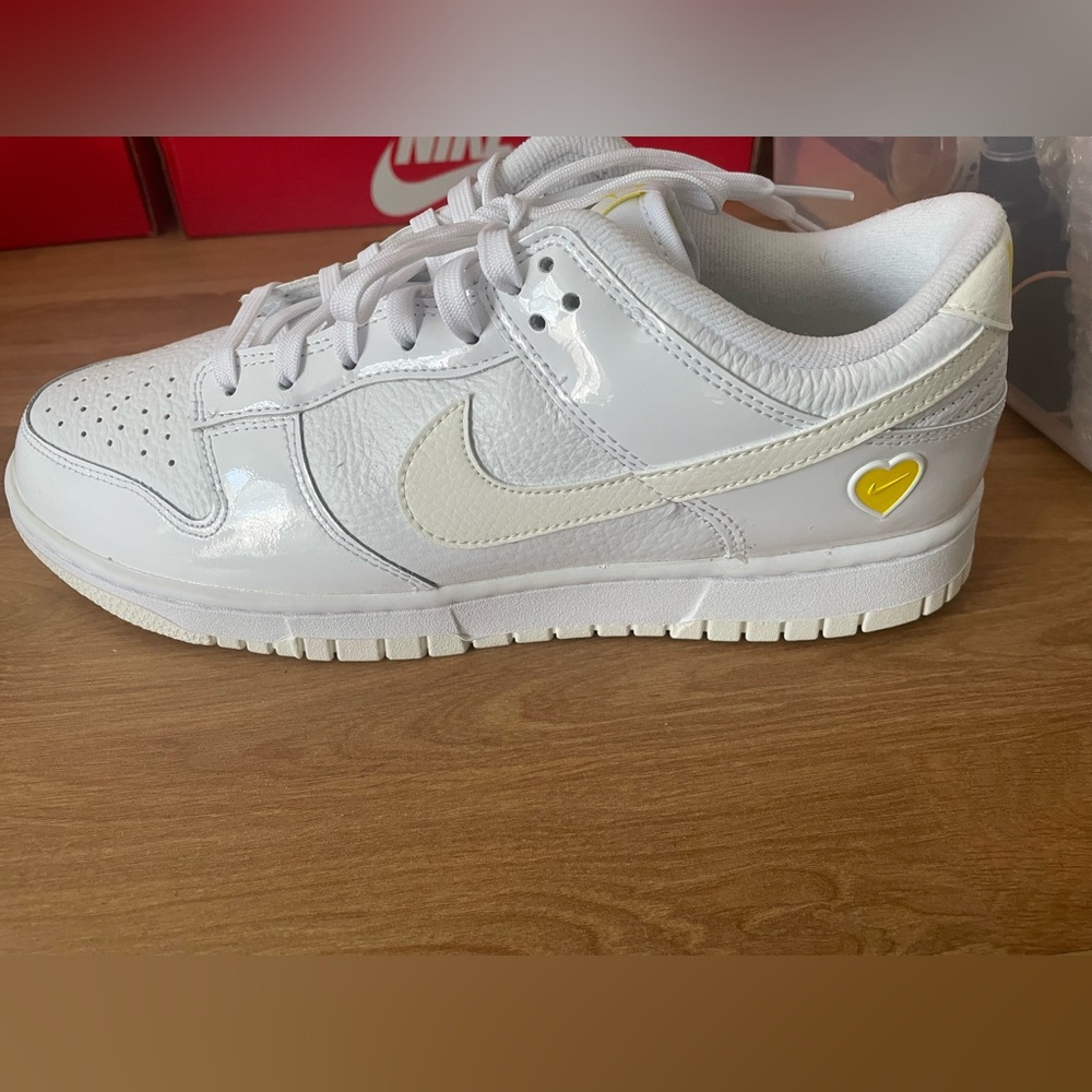 Nike Dunk Low White Low-Top Sneakers with Cream Swoosh and Yellow Heart Accent